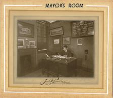 Mayor's Room; Frank G Pursell, Mayor 1939-1940 is pictured at his desk in the Mayor's room in 1939. Creator: Unknown