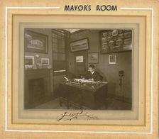 Mayor's Room; Frank G Pursell, Mayor 1939-1940 is pictured at his desk in the Mayor's room in 1939. Creator: Unknown