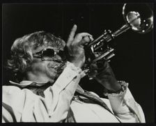 Maynard Ferguson playing the trumpet. Creator: Denis Williams