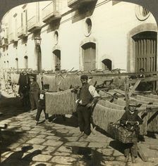 Macaroni drying in the dirty streets of Naples, Italy c1909. Creator: Unknown