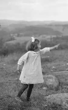 MacKaye, Percy, daughter of, standing outdoors, 1913 Sept. Creator: Arnold Genthe