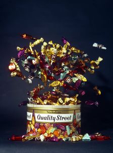 Mackintosh's Quality Street, exploding tin advertisment shot, 1972. Creator: Michael Walters