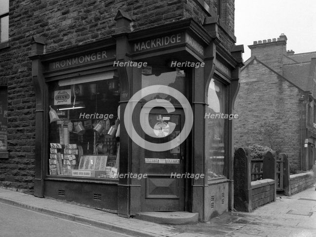 Mackridge's ironmonger's shop, Wombwell, South Yorkshire, 1962. Creator: Michael Walters.