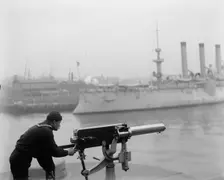 Machine gun at Brooklyn Navy Yard, between 1890 and 1901. Creator: Unknown