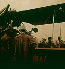 Machine gun mounted on a biplane, exhaust towards the top, c1914-c1918