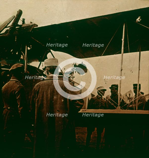 Machine gun mounted on a biplane, exhaust towards the top, c1914-c1918. Artist: Unknown.