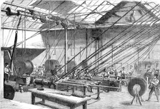 Machines covering with Gutta Percha the Atlantic Cable Wire, at the Gutta Percha Company's..., 1857. Creator: Unknown