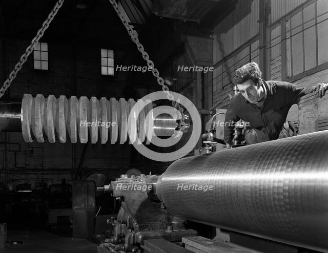 Machining industrial rollers at the Wombwell Foundry & Engineering Co, South Yorkshire, 1963. Creator: Michael Walters.