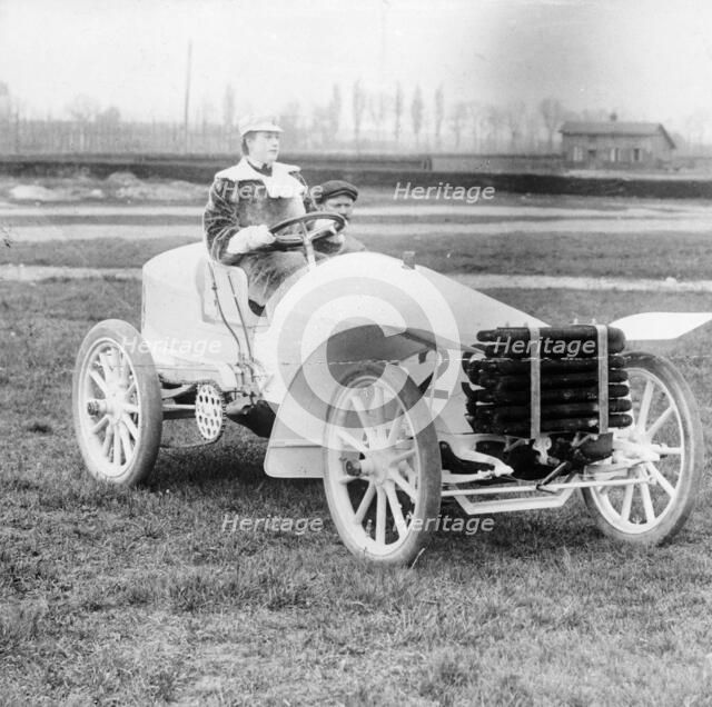 Madame du Gaste at the wheel of a De Dietrich, (c1910?). Artist: Unknown