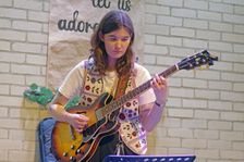 Maddy Salter, International Women’s Day, NJA Fundraiser, Baptist Church, Loughton, Essex, 2025. Creator: Brian O'Connor