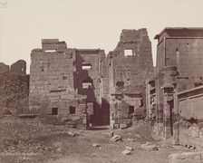 Madinet Habu, Exterior of the Entrance Gate of Mortuary Temple of Ramesses III, late 19th century. Creator: Henri Bechard