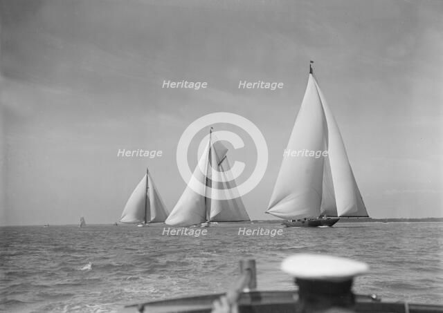 Magnificent group of 1st Class Races: 'Shamrock V', 'White Heather' and 'Candida', 1930.  Creator: Kirk & Sons of Cowes.