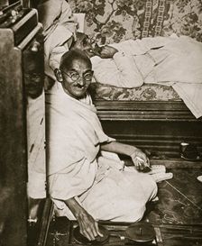 Mahatma Gandhi visiting London for Round Table conferences, September 1931. Creator: Topical Press Agency