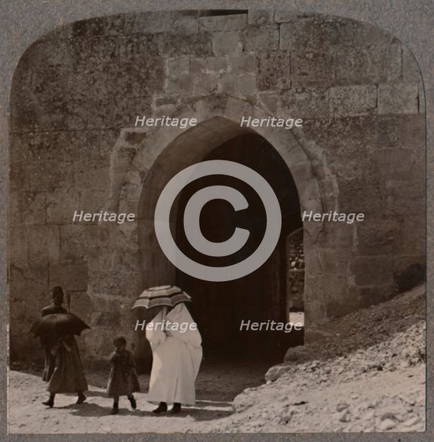 'Mahommedan women entering Jerusalem by Herod's Gate', c1900. Artist: Unknown.