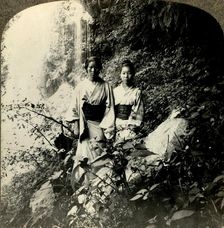 Maidens of the Land of the Rising Sun, beneath the Kogijoku waterfalls... c1900. . Creator: Unknown