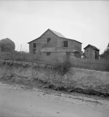 Mailbox and farm along country road in Person County, North Carolina, 1939. Creator: Dorothea Lange