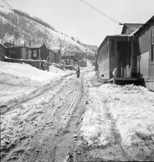 Main street in a Utah coal mining settlement, Consumers, near Price, Utah, 1936. Creator: Dorothea Lange