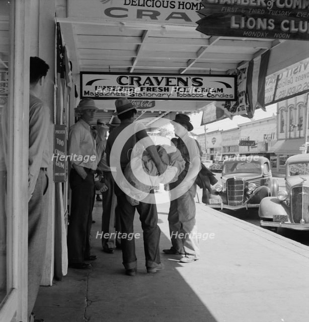 Main street, in front of Oregon Employment Center office, Independence, Polk County, Oregon, 1939. Creator: Dorothea Lange.