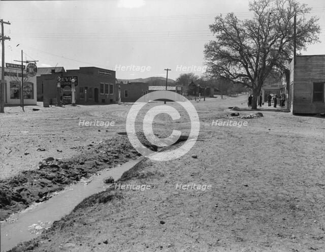 Main street of town showing irrigation ditch, Escalante, Utah, 1936. Creator: Dorothea Lange.