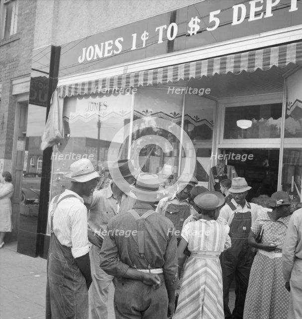Main street, Saturday afternoon, Pittsboro, North Carolina, 1939. Creator: Dorothea Lange.