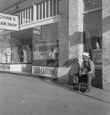 Main street storefront, Chickasaw, Oklahoma, 1937. Creator: Dorothea Lange