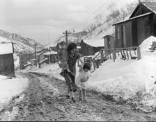 Main street, Utah coal town, Consumers, near Price, Utah, 1936. Creator: Dorothea Lange