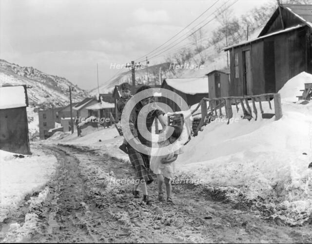 Main street, Utah coal town, Consumers, near Price, Utah, 1936. Creator: Dorothea Lange.