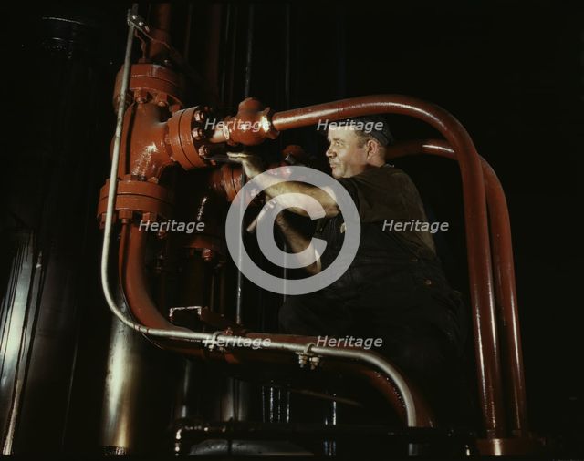Maintenance man at the Combustion Engineering Co. working at the largest...Chattanooga, Tenn., 1942. Creator: Alfred T Palmer.