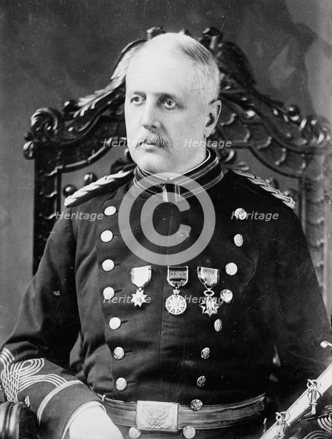 Maj. W. F. Tucker, seated, in uniform, 1915. Creator: Bain News Service.