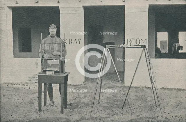 'Major Battersby using the Localizing Apparatus', c1890, (1910). Artist: Unknown.