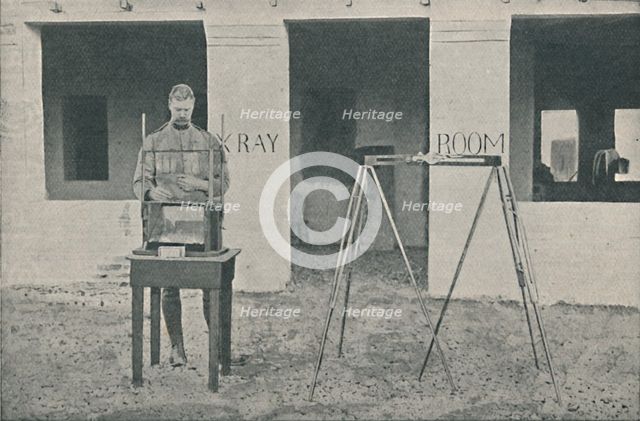 'Major Battersby using the Localizing Apparatus', c1890, (1910). Artist: Unknown.