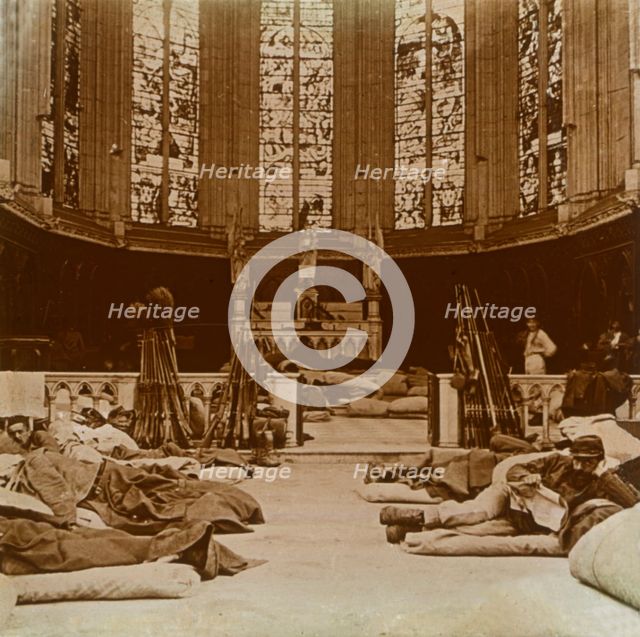 Makeshift barracks in a church, Marne, northern France, 1914.  Artist: Unknown.