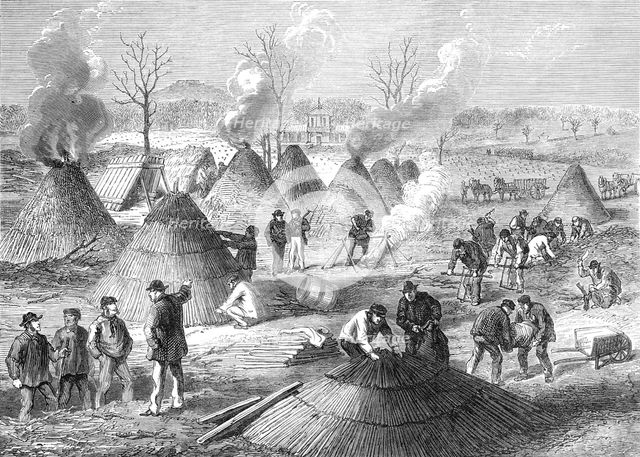 Making charcoal in the Bois de Boulogne, Paris, (sketch by balloon post), 1871. Creator: Unknown.