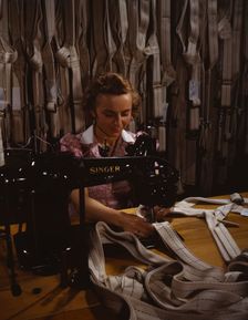 Making harnesses, Mary Saverick stitching, Pioneer Parachute Company Mills, Manchester, Conn., 1942. Creator: William Rittase