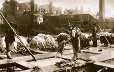 Making leather in the lime yard at Neckinger Mills, London, 20th century