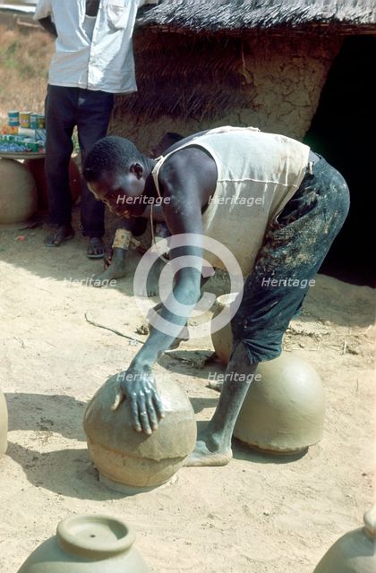 Making pots without a wheel, Nigeria, c1966. Creator: Unknown.