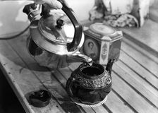 Making tea, c1955. Creator: Arthur Charles Kirby Ware