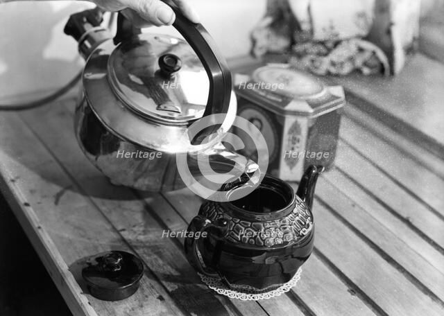 Making tea, c1955. Creator: Arthur Charles Kirby Ware.