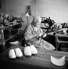 Making wooden clogs, Sweden. Creator: Unknown