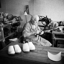 Making wooden clogs, Sweden. Creator: Unknown
