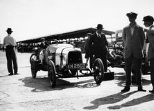 Malcolm Campbell and a Talbot car in the Paddock at Brooklands, Surrey, June 1923