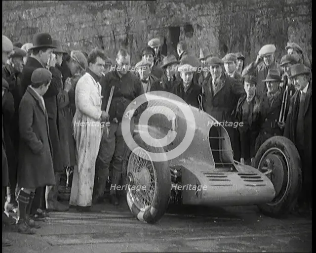 Malcolm Campbell Preparing his Car 'Bluebird' Watched By a Crowd of Civilians, 1927. Creator: British Pathe Ltd.