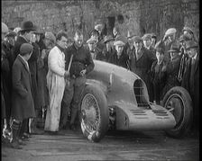 Malcolm Campbell Preparing his Car Bluebird Watched By a Crowd of Civilians, 1927. Creator: British Pathe Ltd