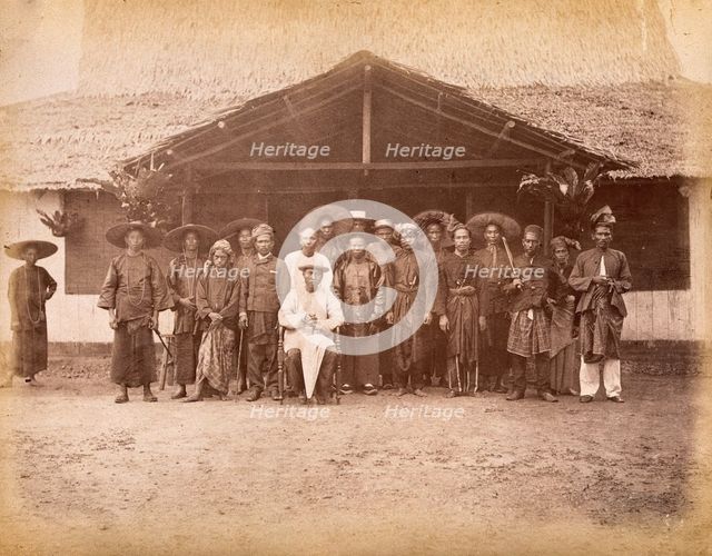 Malaya: Captain China surrounded by his Chinese and Malay followers, 1880. Creator: John Edmund Taylor.