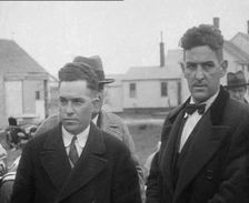 Male American Civilians Being Arrested by the Police, 1930. Creator: British Pathe Ltd