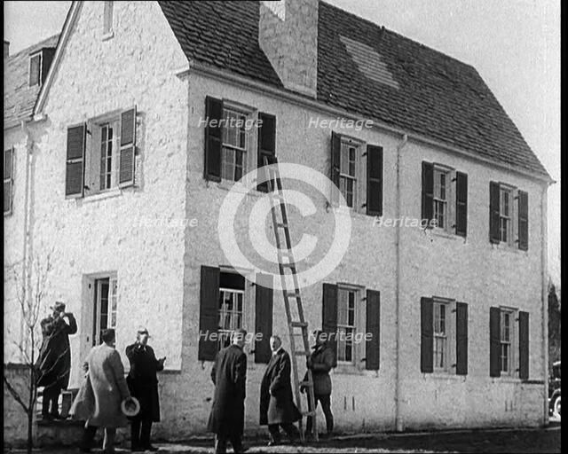 Male American Civilians in Front of American Aviator Charles Augustus Lindbergh's House..., 1930s. Creator: British Pathe Ltd.