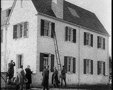 Male American Civilians in Front of American Aviator Charles Augustus Lindbergh's House..., 1930s. Creator: British Pathe Ltd