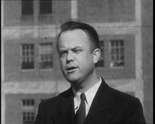 Male American Officer Giving an Official Statement Outside a Prison During the Investigation...,1930 Creator: British Pathe Ltd