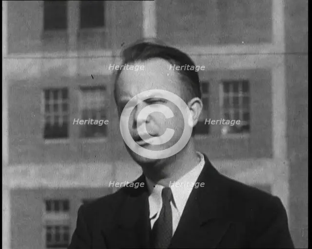 Male American Officer Giving an Official Statement Outside a Prison During the Investigation...,1930 Creator: British Pathe Ltd.