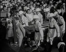 Male American Soldiers in White Uniforms Carrying the Coffin of Anton Cermak, the Mayor of..., 1933. Creator: British Pathe Ltd